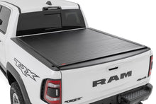 Load image into Gallery viewer, Rough Country Hard Roll Up Bed Cover 5'7" Bed - Ram 1500 DT (19-26) - 1500 TRX / RHO (21-24) (25-27)