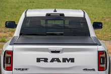 Load image into Gallery viewer, Rough Country Hard Roll Up Bed Cover 5'7" Bed - Ram 1500 DT (19-26) - 1500 TRX / RHO (21-24) (25-27)