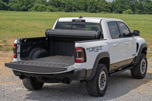 Load image into Gallery viewer, Rough Country Hard Roll Up Bed Cover 5'7" Bed - Ram 1500 DT (19-26) - 1500 TRX / RHO (21-24) (25-27)