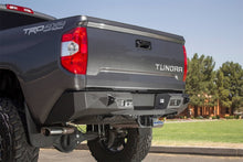 Load image into Gallery viewer, Addictive Desert Designs 2014+ Toyota Tundra Stealth Fighter Rear Bumper w/ Backup Sensor Cutouts