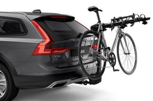 Load image into Gallery viewer, Thule Apex XT 4 - Hanging Hitch Bike Rack w/HitchSwitch Tilt-Down (Up to 4 Bikes) - Black